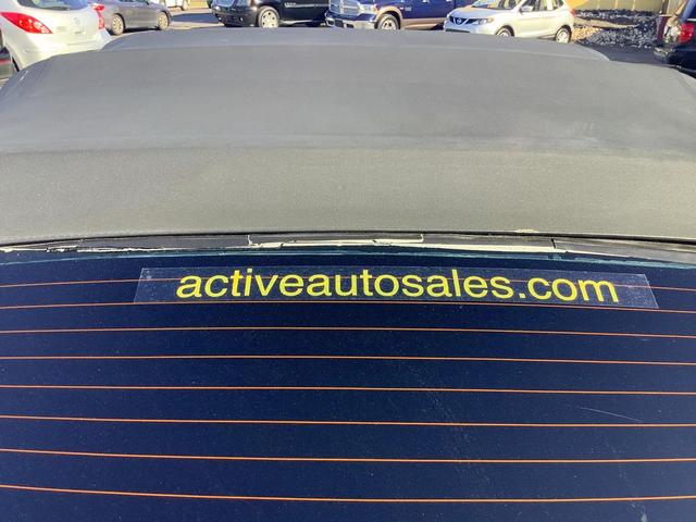 Photo of 2004 Black Ford Mustang