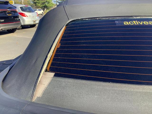 Photo of 2004 Black Ford Mustang