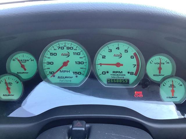 Photo of 2004 Black Ford Mustang
