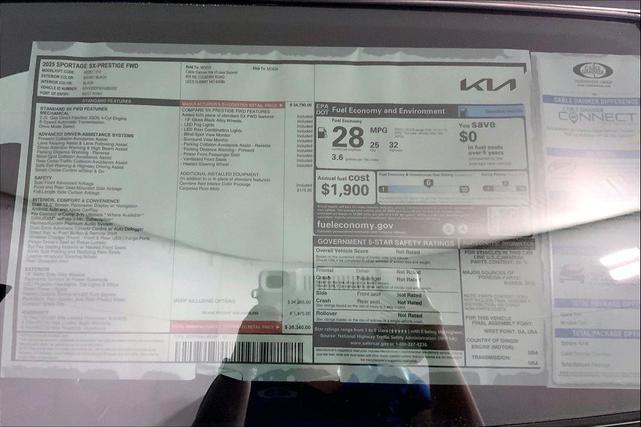 Photo of 2025 Ebony Black Kia Sportage