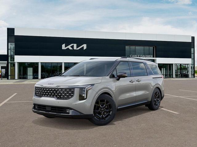 Photo of 2026 Ivory Silver Kia Carnival Hybrid
