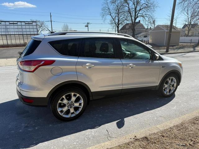 Photo of 2014 Ingot Silver Metallic Ford Escape