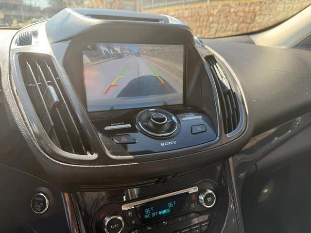 Photo of 2014 Ingot Silver Metallic Ford Escape