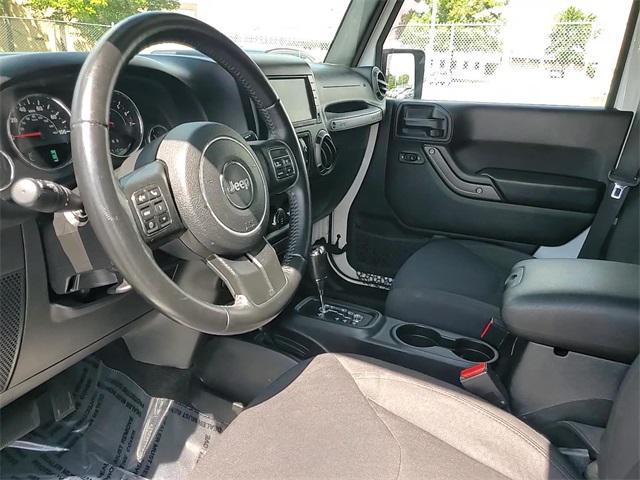 Photo of 2017 Bright White Clearcoat Jeep Wrangler Unlimited