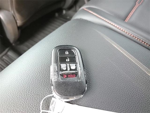 Photo of 2025 Platinum White Pearl Honda CR-V Hybrid