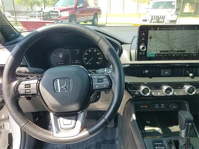 Photo of 2025 Platinum White Pearl Honda CR-V Hybrid