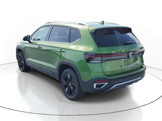 Photo of 2025 Bright Moss Green Metallic Volkswagen Taos