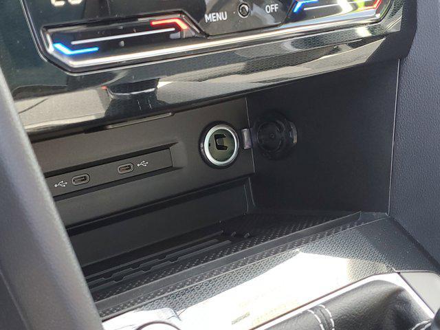 Photo of 2025 Bright Moss Green Metallic Volkswagen Taos