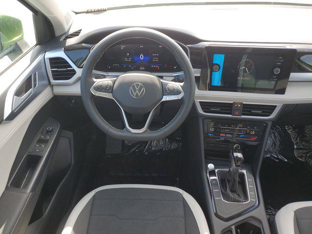 Photo of 2025 Bright Moss Green Metallic Volkswagen Taos