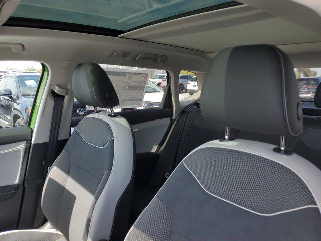 Photo of 2025 Bright Moss Green Metallic Volkswagen Taos