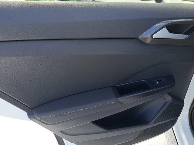 Photo of 2025 Pure White w/Deep Black Roof Volkswagen Taos
