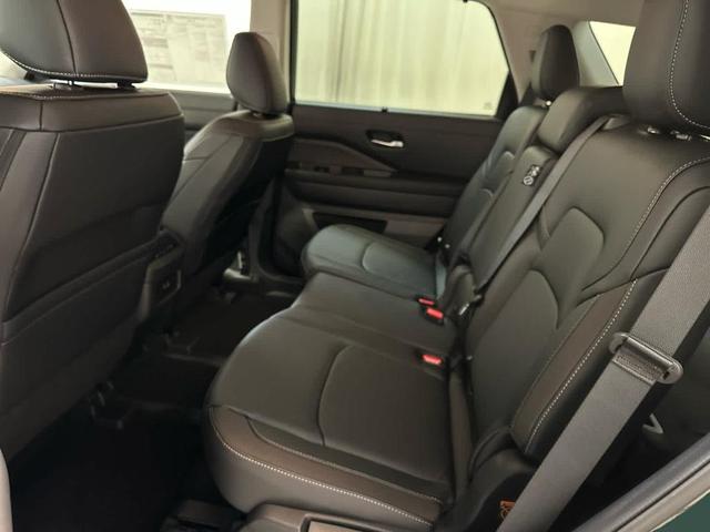 Photo of 2025 Obsidian Green Nissan Pathfinder