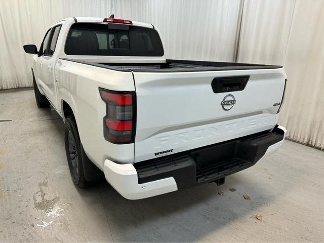 Photo of 2025 Glacier White Nissan Frontier