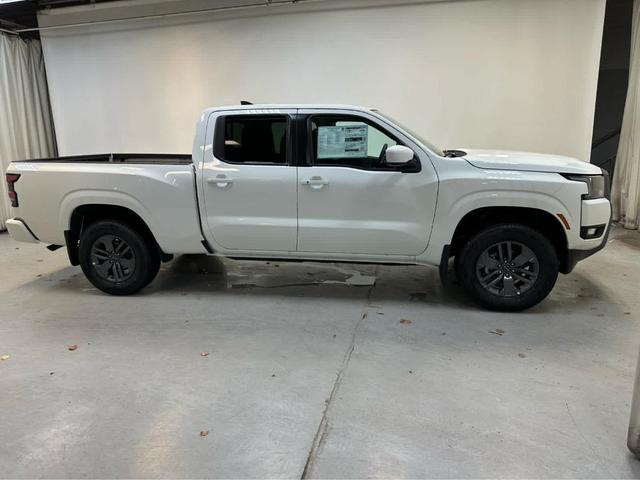 Photo of 2025 Glacier White Nissan Frontier
