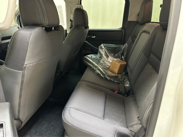 Photo of 2025 Glacier White Nissan Frontier