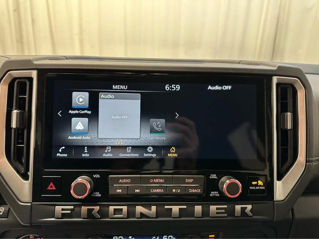 Photo of 2025 Glacier White Nissan Frontier