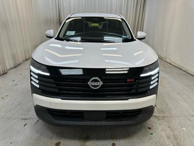 Photo of 2025 Aspen White Tri Nissan Kicks