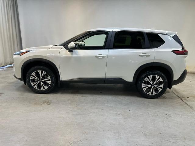 Photo of 2023 Pearl White Tri-Coat Nissan Rogue
