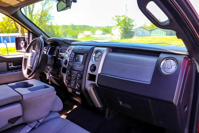 Photo of 2014 Ruby Red Metallic Tinted Clearcoat Ford F-150