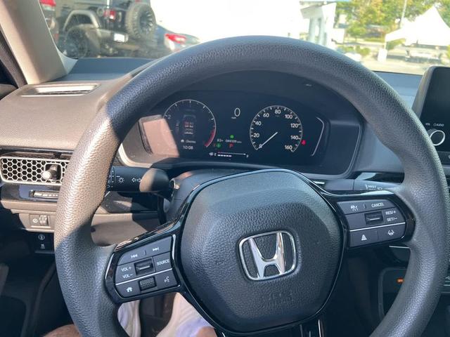Photo of 2023 Aegean Blue Metallic Honda Civic