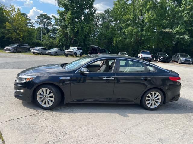 Photo of 2018 Ebony Black Kia Optima