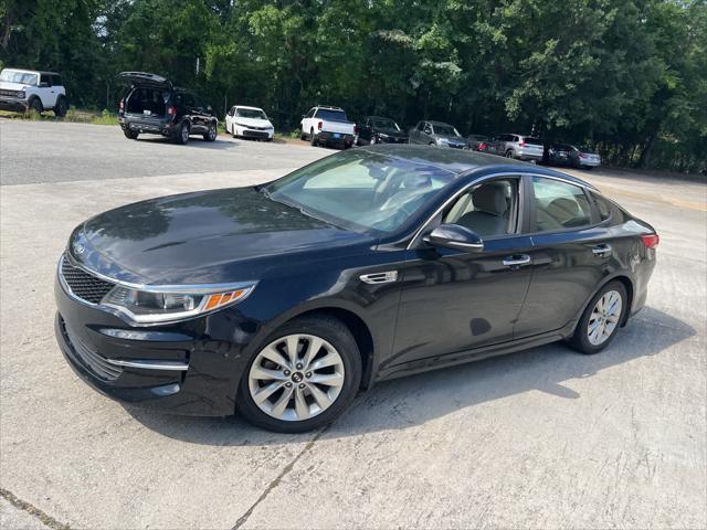 Photo of 2018 Ebony Black Kia Optima