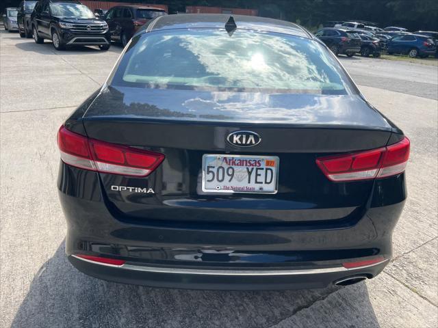 Photo of 2018 Ebony Black Kia Optima