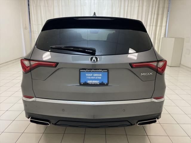 Photo of 2023 Liquid Carbon Metallic Acura MDX