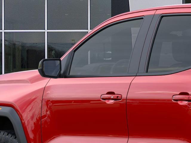 Photo of 2025 Volcanic Red Tintcoat GMC Canyon