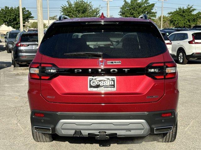 Photo of 2025 Radiant Red Metallic II Honda Pilot