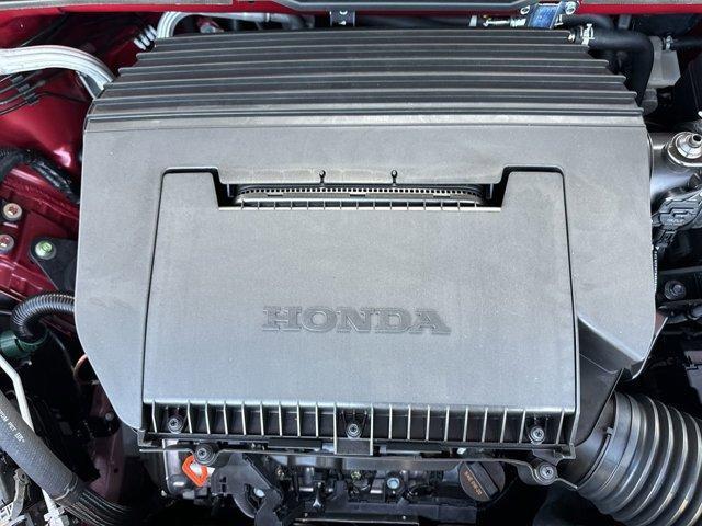 Photo of 2025 Radiant Red Metallic II Honda Pilot