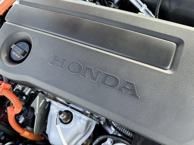 Photo of 2026 Rallye Red Honda Civic Hybrid