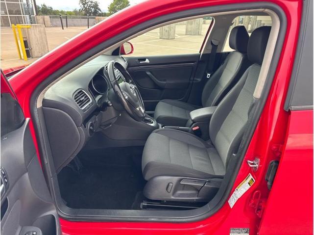 Photo of 2014 Tornado Red Volkswagen Jetta SportWagen