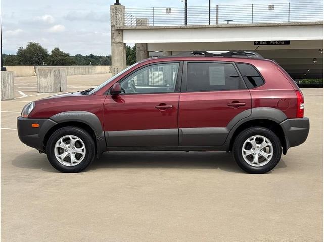 Photo of 2009 Mesa Red Pearl Hyundai TUCSON