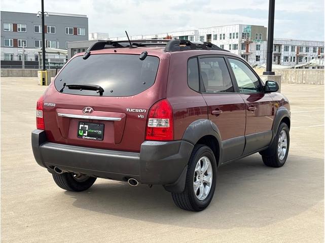 Photo of 2009 Mesa Red Pearl Hyundai TUCSON