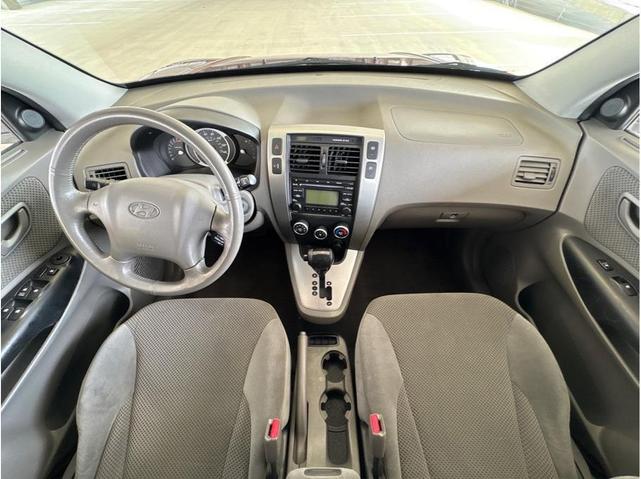 Photo of 2009 Mesa Red Pearl Hyundai TUCSON