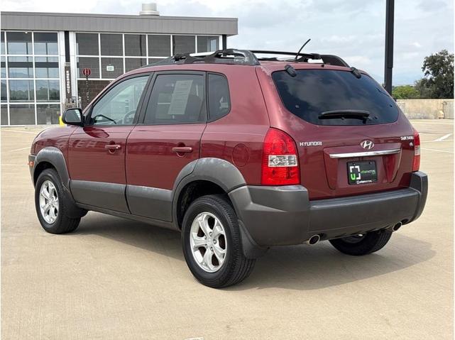 Photo of 2009 Mesa Red Pearl Hyundai TUCSON