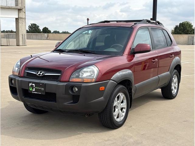 Photo of 2009 Mesa Red Pearl Hyundai TUCSON