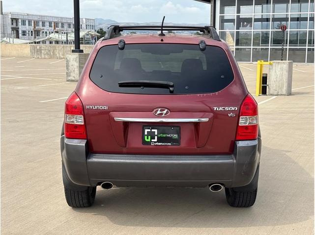 Photo of 2009 Mesa Red Pearl Hyundai TUCSON