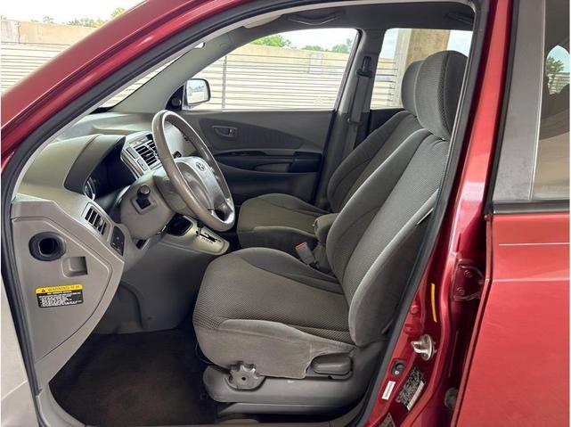 Photo of 2009 Mesa Red Pearl Hyundai TUCSON