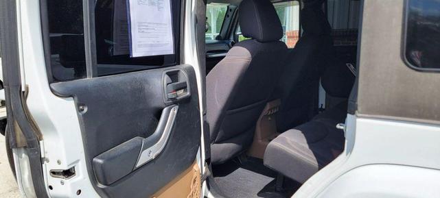 Photo of 2013 Bright White Clearcoat Jeep Wrangler Unlimited