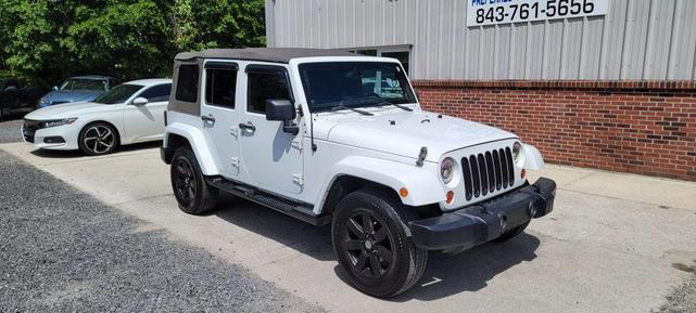 Photo of 2013 Bright White Clearcoat Jeep Wrangler Unlimited