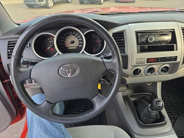 Photo of 2005 Orange Toyota Tacoma