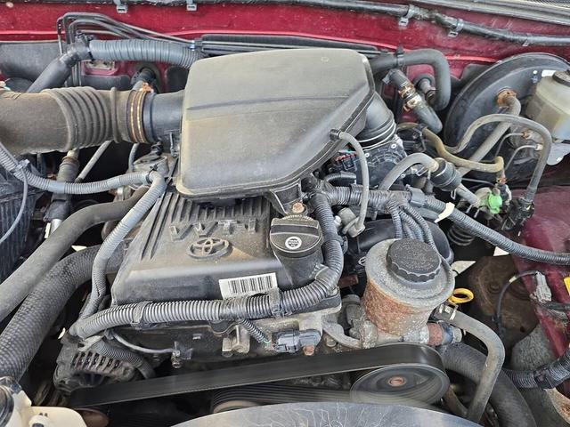 Photo of 2005 Orange Toyota Tacoma