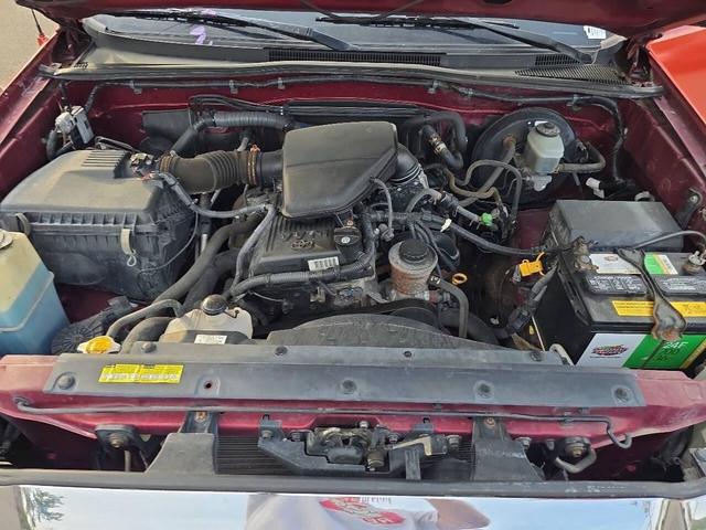 Photo of 2005 Orange Toyota Tacoma