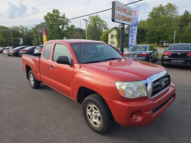 Photo of 2005 Orange Toyota Tacoma