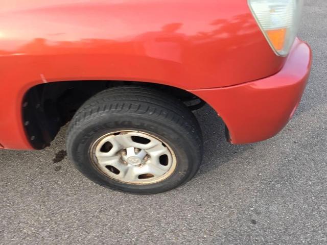 Photo of 2005 Orange Toyota Tacoma