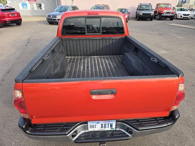 Photo of 2005 Orange Toyota Tacoma