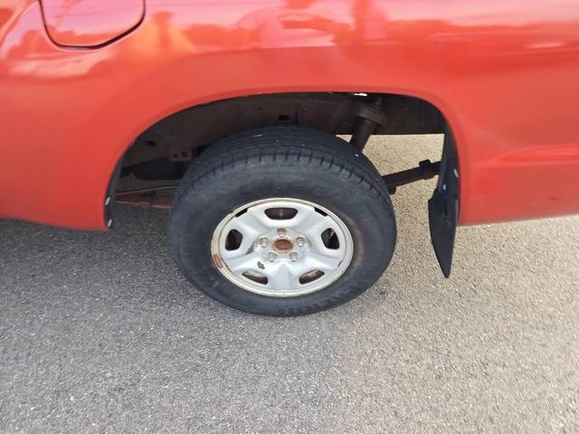 Photo of 2005 Orange Toyota Tacoma
