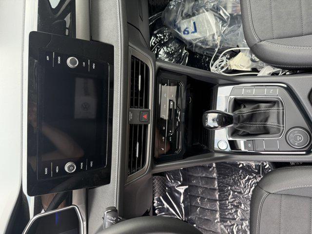 Photo of 2025 Bright Moss Green Metallic/Deep Black Roof Volkswagen Taos